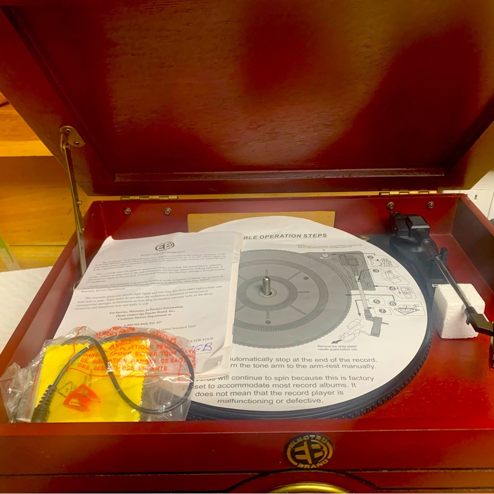 Five and one radio. Plays CD/radio/Cassette tapes/records...